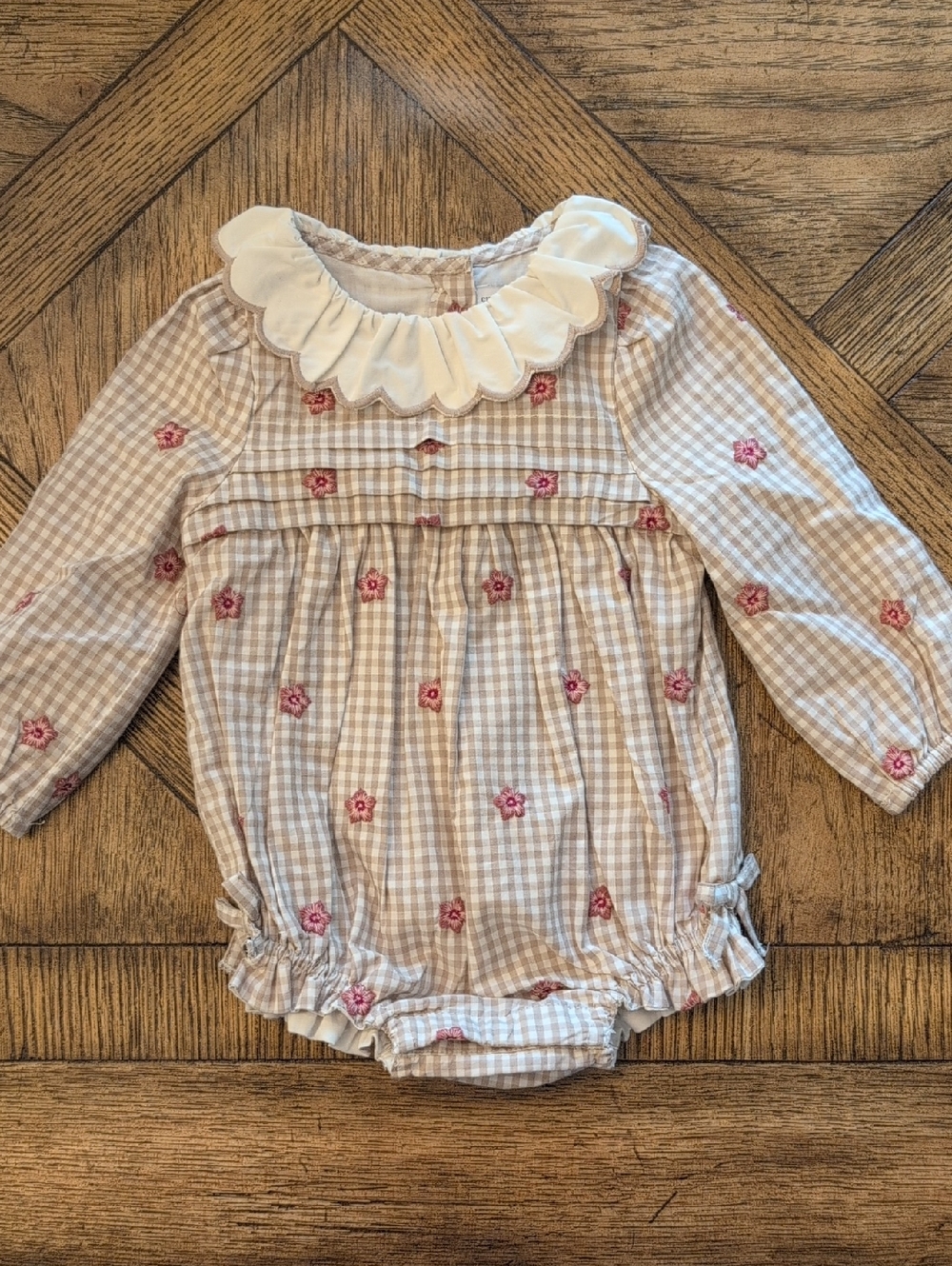 cupcakes & cashmere Cream Baby Romper with Tan Gingham and Pink Floral Stitch